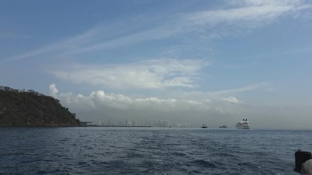 Cityscape of Panama City, Panama and boats in the harbor.