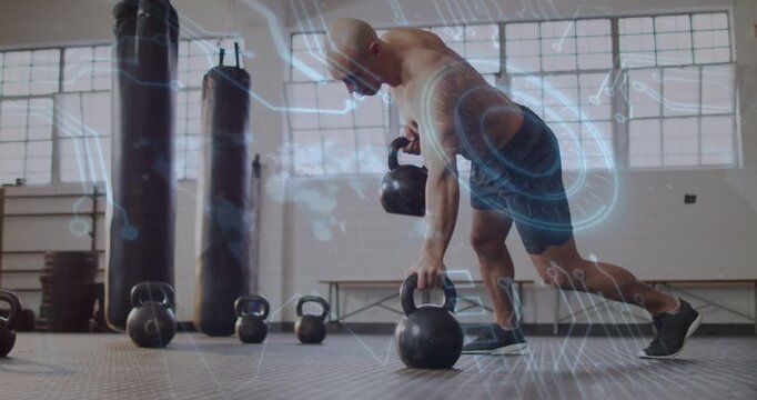 Male athlete shifting weight, performing kettlebell rows for fitness, blue overlay aligning torso