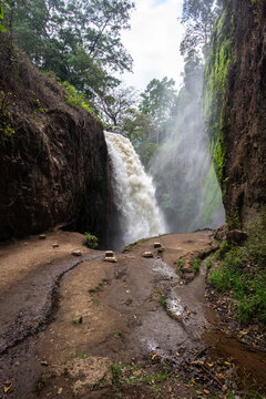 Scenery view of powerful of Blawan waterfall located in Kalianyar village, Sempol district of East Java, Indonesia.