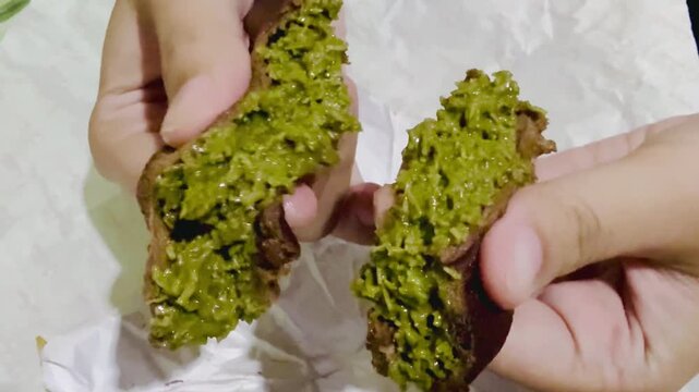 Texture of chewy chocolate marshmallow with pistachio kadayif filling