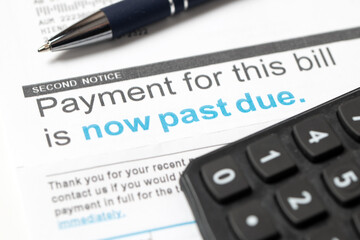 Fototapeta premium Medical billing statement showing a past due amount, with a pen placed on top. Highlights financial stress, healthcare costs, insurance adjustments, and overdue payments.
