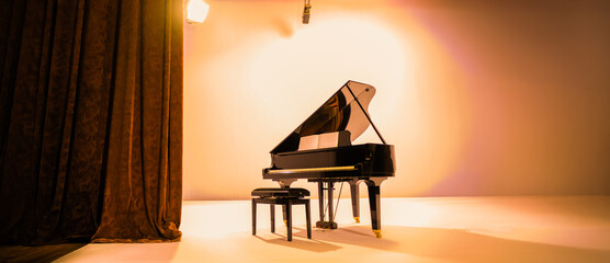 concert backdrop with a grand piano on stage and curtains © serhii