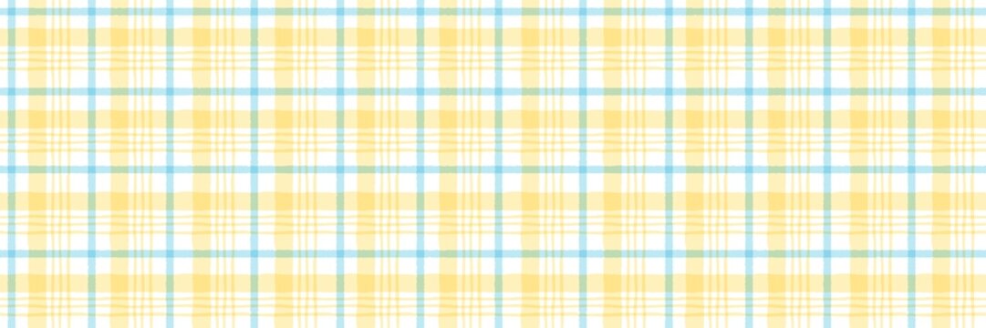 Hand-drawn seamless plaid pattern with yellow and blue watercolor strokes on a white background. Simple checkered textile design for spring and summer decor.