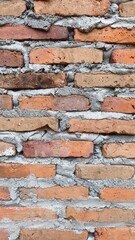 Obraz premium Close-Up Brick Wall Texture with Rough Cement Mortar Background
