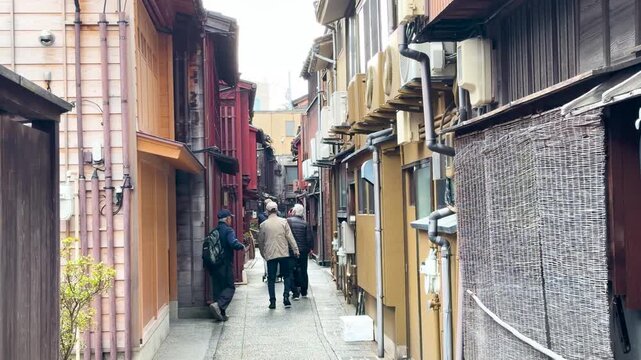 Tourists Walking Through Narrow Alley in Higashi Chaya District Kanazawa