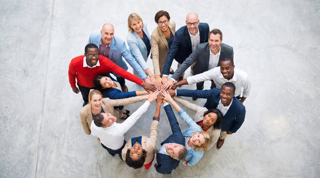 Business team teamwork collaboration diverse group stack hands office corporate professional colleague unity top view overhead