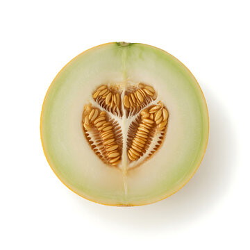 Half of fresh honeydew melon with seeds isolated on white background, top view