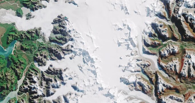 Aerial view on north Patagonia. Ice, glaciers and mountains covered with snow. Camera is zooming out, rotating counterclockwise. Animation based on image by NASA