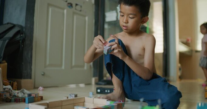 Kids boy and girl enjoy play toy in cozy room enjoy together kids education learnning