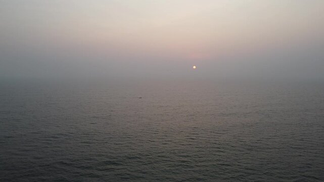 Aerial Sunset View of a Traditional Boat on the Arabian Sea, Kannur, Kerala