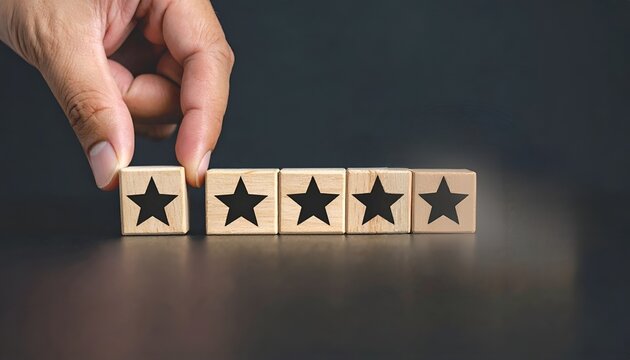 Customer review concept with hand placing final star, representing perfect rating and outstanding service.