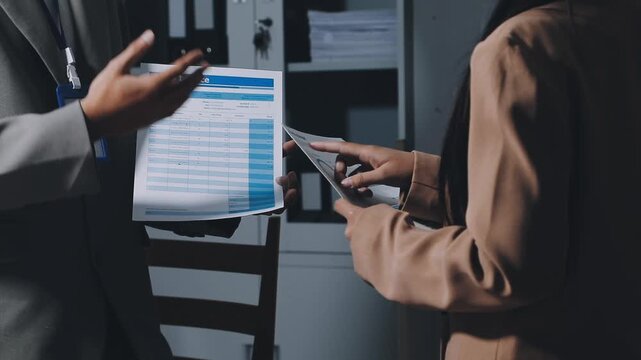 Asian business adviser meeting to analyze and discuss the situation on the financial report in the meeting room.Investment Consultant, Financial advisor and accounting concept