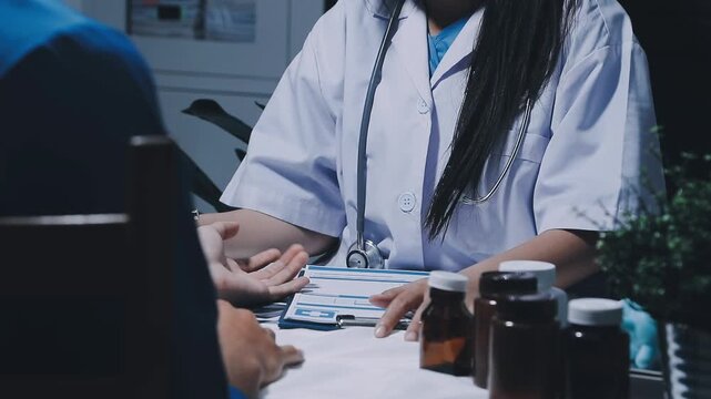 Doctor checking blood pressure of a patient, he is measuring pulses with a sphygmomanometer, hands close up