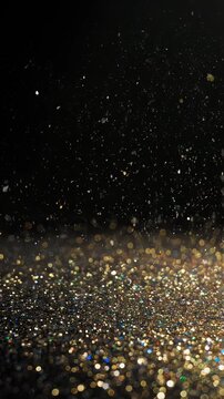 Dense multicolor glitter particles sparkle against a dark background creating a festive abstract texture for celebration party luxury and digital design useglitter
