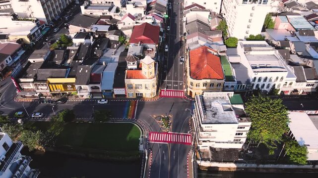 Drone footage Aerial view of Phuket Old Town night market at sunset, in Phuket, Thailand  Sino-Portuguese Architecture The morning is sunny, the weather is nice, and it's a nice place to visit.