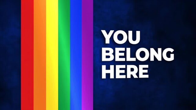 Rainbow flag with 'You Belong Here' message on dark background