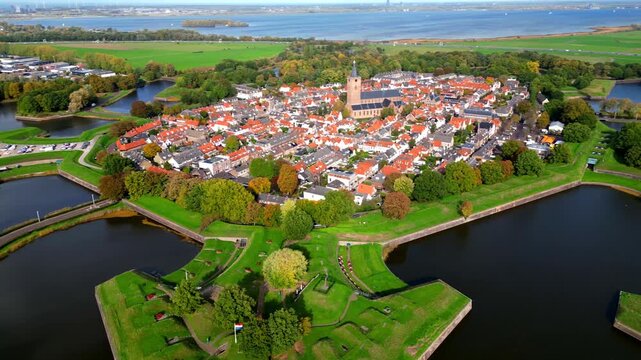 Aerial view of Naarden star fort city in Netherlands with historic fortifications and water moats