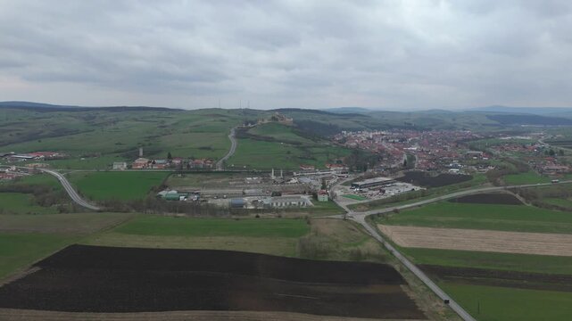 Aerial drone approach over Rupea village