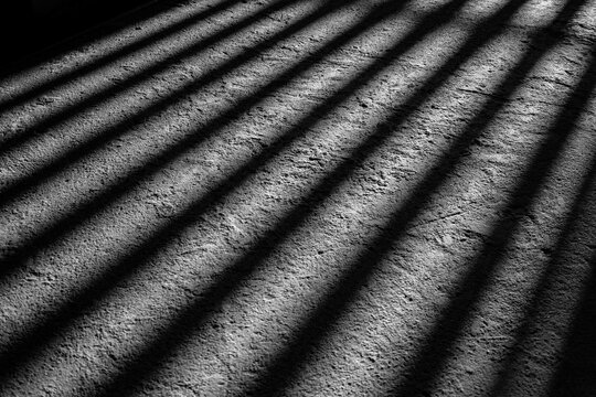 วันที่ส่ง: 15 เมษายน 2569

คำอธิบาย
The reflection of a steel cage on the rough concrete floor. A concept of being condemned and deprived of freedom. Isolation and fear. Background image for text illu