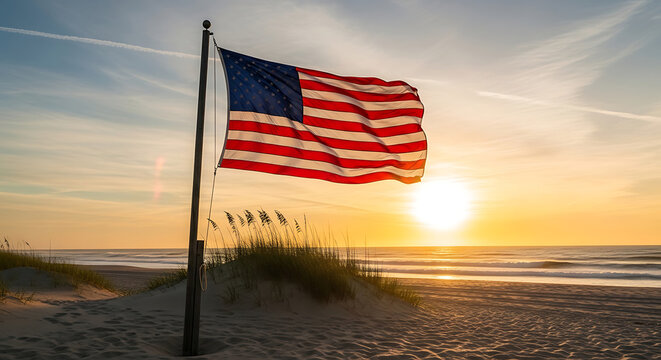 American Flag Waving at Sunrise on a Sandy Beach.