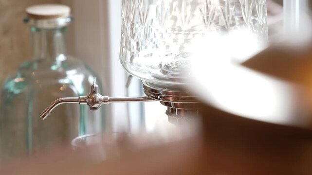 Close-up of traditional absinthe fountain with slow camera movement