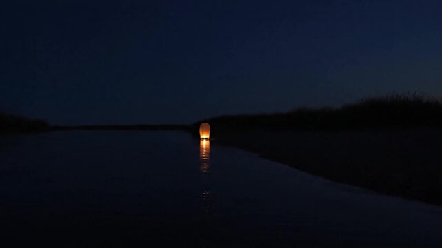 Lantern Drifting into Night Sky with Soft Light Glow and Peaceful Floating Motion