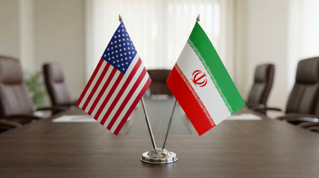 USA and Iran flags on meeting table in conference room, diplomacy and conflict resolution concept. 
