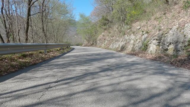 POV driving on a narrow countryside road near Rocchetta a Volturno, Italy
