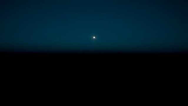 venus. The morning star visible above the horizon before sunrise in a dark blue sky. travel magazines, destination branding, designed for travel destination branding, used by web designers.
