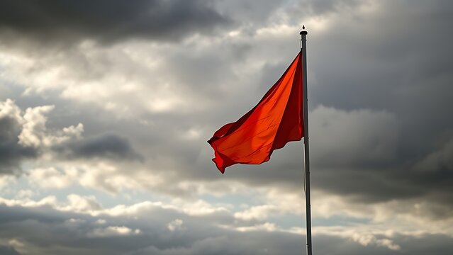 windsock. A single windsock straining in strong wind against a dramatic cloudy sky, dynamic motion. travel magazines, destination branding, designed for outdoor magazines and nature guides.
