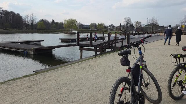 A city bike trip on a spring day to Walczeski Ponds in Grodzisk Mazowiecki near Warsaw, Masovia, Poland.