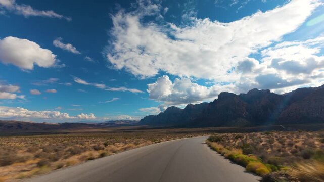 Red Rock Canyon Scenic Drive Loop POV 4K Sunny Day Dramatic Clouds Nevada