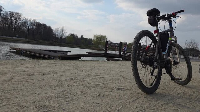A city bike trip on a spring day to Walczeski Ponds in Grodzisk Mazowiecki near Warsaw, Masovia, Poland.