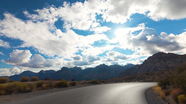Red Rock Canyon Scenic Drive Loop POV 4K Sunny Day Dramatic Clouds Nevada