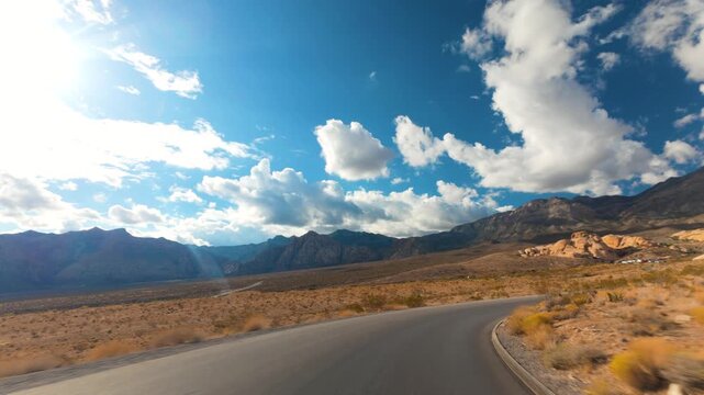 Red Rock Canyon Scenic Drive Loop POV 4K Sunny Day Dramatic Clouds Nevada