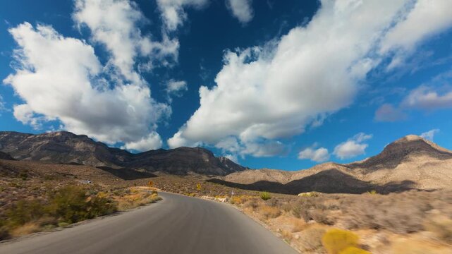 Red Rock Canyon Scenic Drive Loop POV 4K Sunny Day Dramatic Clouds Nevada