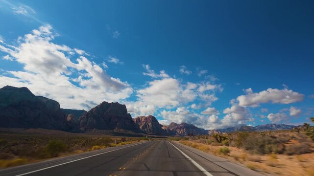 Red Rock Canyon Scenic Drive Loop POV 4K Sunny Day Dramatic Clouds Nevada