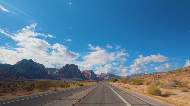 Red Rock Canyon Scenic Drive Loop POV 4K Sunny Day Dramatic Clouds Nevada
