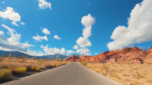 Red Rock Canyon Scenic Drive Loop POV 4K Sunny Day Dramatic Clouds Nevada