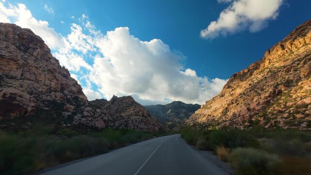 Red Rock Canyon Scenic Drive Loop POV 4K Sunny Day Dramatic Clouds Nevada