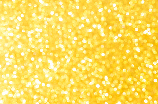 Close up blurred gold bokeh background, abstract shiny gold texture background
