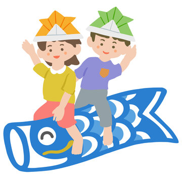 鯉のぼりに乗っている女の子と男の子