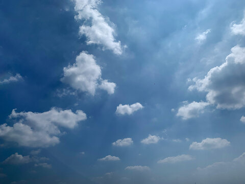 Cumulus Clouds In A Blue Sky