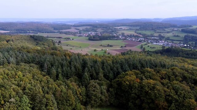 Aerial Drone Panorama of Rural Valley and Mixed Forest near Dieburg, Hesse, Germany in Autumn