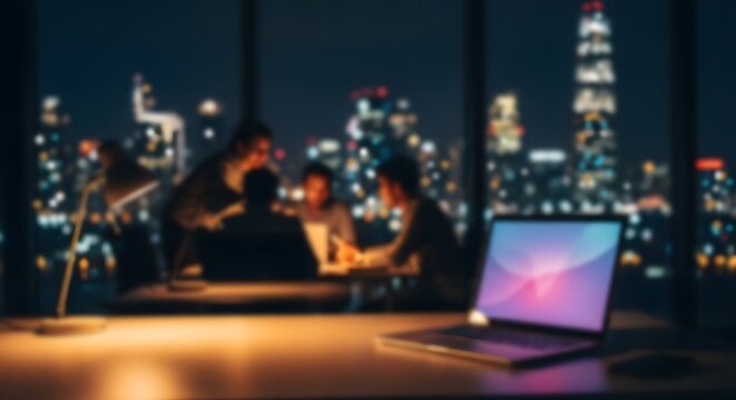 Modern office background with people working late city view laptop and collaborative workspace