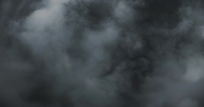 Smoke on black background. Premium cinematic fog and smoke VFX element featuring smooth, continuous motion and carefully balanced density that creates a believable and engaging atmospheric effect.