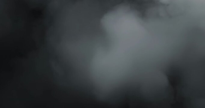 Smoke on black background. Premium cinematic fog and smoke VFX element featuring smooth, continuous motion and carefully balanced density that creates a believable and engaging atmospheric effect.