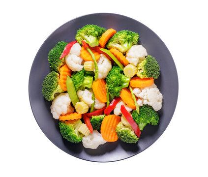 plate of mix of steamed vegetables isolated on transparent background, top view