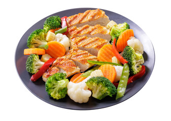 plate of grilled chicken and mix of steamed vegetables isolated on transparent background