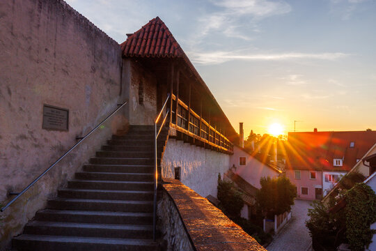 N&ouml;rdlingen city in germany bavaria oldtown innercity during sunset golden hour golden light citywall wall 